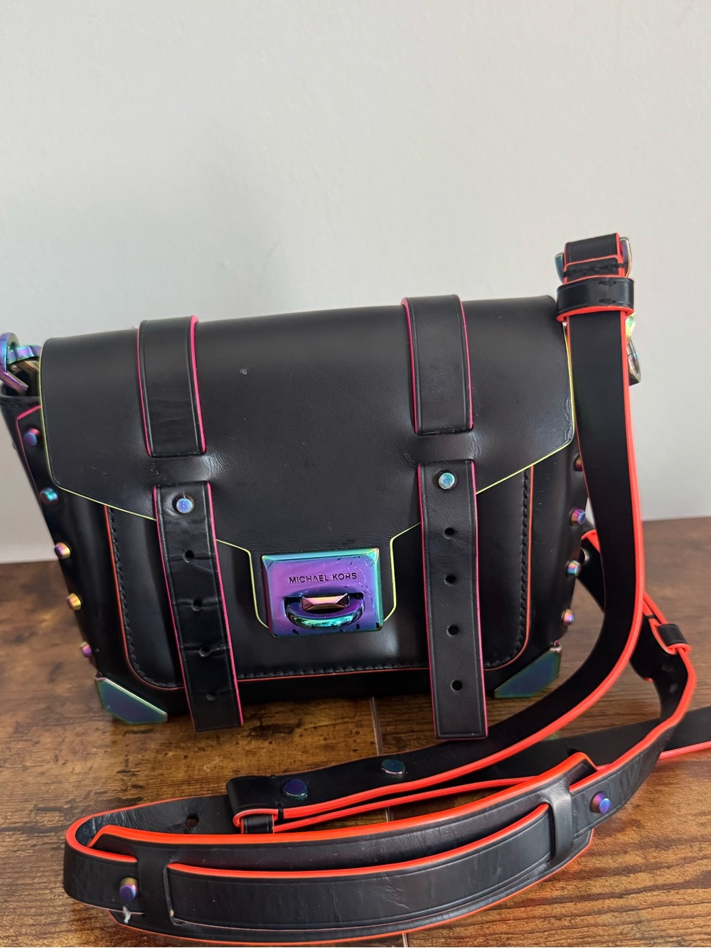 Michael Kors Black Leather Messenger Bag with Neon Trim and Iridescent Hardware